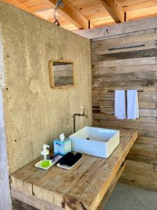 a bathroom with a sink on a wooden counter at Casa La Mina in Valle de Bravo +49 photos
