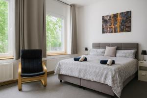 Ένα ή περισσότερα κρεβάτια σε δωμάτιο στο Luxury apartment center of Düsseldorf