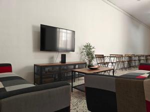 TV a/nebo společenská místnost v ubytování Cosy room 9