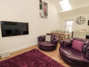 TV/trung tâm giải trí tại Lakes View Apartment 3