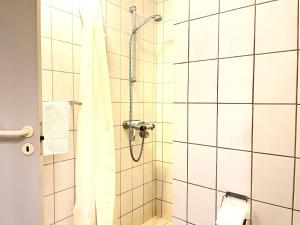 Ένα μπάνιο στο Three bedroom apartment in Frederikshavn,.