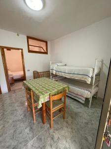 Ένα ή περισσότερα κρεβάτια σε δωμάτιο στο Agriturismo Millepini