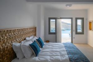 Ένα ή περισσότερα κρεβάτια σε δωμάτιο στο Villa Anasa Kea +63 φωτογραφίες