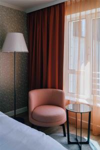 Letto o letti in una camera di Pentahotel Leipzig