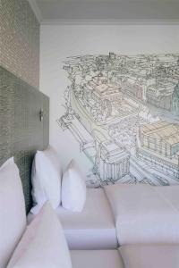 Letto o letti in una camera di Pentahotel Leipzig