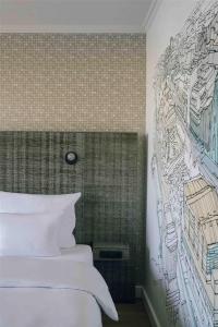 Letto o letti in una camera di Pentahotel Leipzig