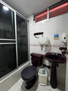 Un baño de Hotel Jimmy Latacunga
