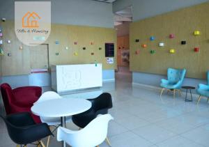 Istumisnurk majutusasutuses Altura Executive Suites - Cyber 5