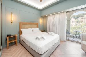 Postel nebo postele na pokoji v ubytování Corfu Mare Hotel -Adults only