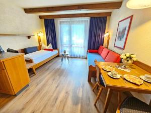 Postel nebo postele na pokoji v ubytování Alpen Apartment