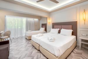 Postel nebo postele na pokoji v ubytování Corfu Mare Hotel -Adults only