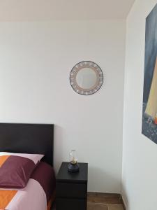 Postel nebo postele na pokoji v ubytování Duplex avec vue sur mer-La Rose des Vents
