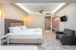 Postel nebo postele na pokoji v ubytování Corfu Mare Hotel -Adults only