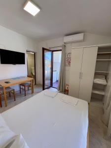 Postel nebo postele na pokoji v ubytování Rooms & Apartments Hegic