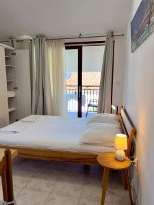 Postel nebo postele na pokoji v ubytování Rooms & Apartments Hegic