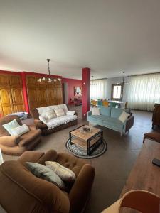 Posezení v ubytování Gîte la Maison de Fram