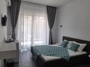 Postel nebo postele na pokoji v ubytování Vila SEA VIBES