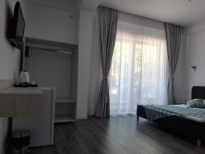 Postel nebo postele na pokoji v ubytování Vila SEA VIBES