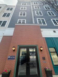 a building with a door in front of it at Luxury Apartment UConn in Storrs