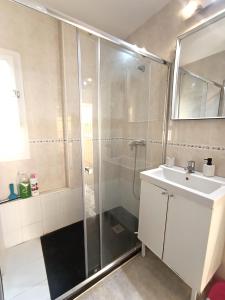 a bathroom with a shower and a sink at Benalmádena Nice Sea Views ! in Benalmádena