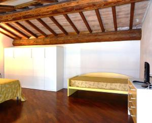 Säng eller sängar i ett rum på Residence Alcorso