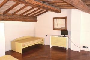 Ein Bett oder Betten in einem Zimmer der Unterkunft Residence Alcorso