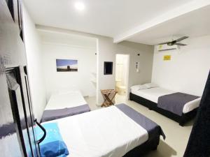 Postel nebo postele na pokoji v ubytování Neos Hotel Cartagena