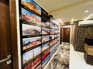 A bed or beds in a room at Blue Scarab Pyramids View