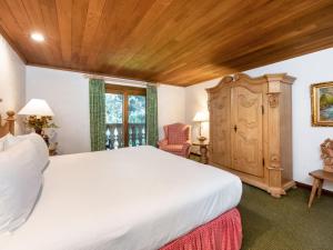 Voodi või voodid majutusasutuse Christiania Lodge toas