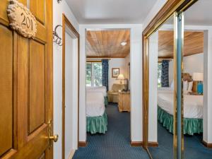 Voodi või voodid majutusasutuse Christiania Lodge toas