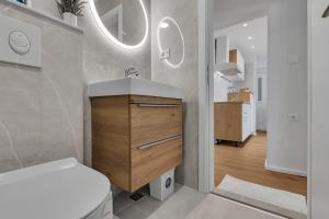 Koupelna v ubytování Apartments Piano + 32 fotografií
