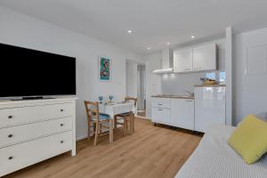 Kuchyň nebo kuchyňský kout v ubytování Apartments Piano