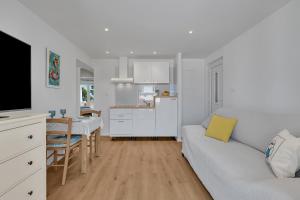 Kuchyň nebo kuchyňský kout v ubytování Apartments Piano