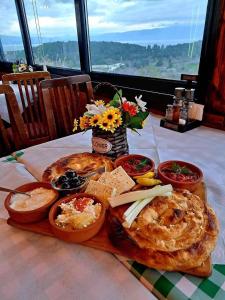 a plate of food on top of a table at Etno Gostilnica Villa Fulko in Ohrid +26 photos