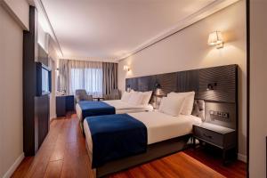 Una cama o camas en una habitación de Best Western Izmir Hotel 172 fotos más