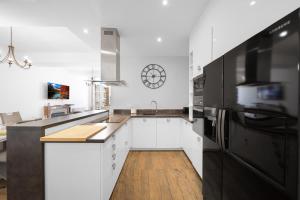 Η κουζίνα ή μικρή κουζίνα στο Le Home Carnot - Hypercentre de Beaune