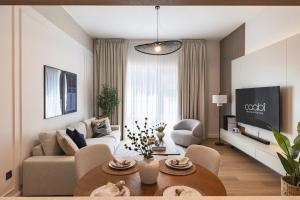 Μια τηλεόραση ή/και κέντρο ψυχαγωγίας στο The Fountain Views Suite in Downtown Dubai
