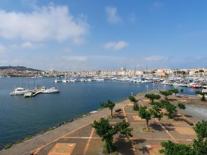 a marina with boats docked in a harbor at Studio vue Mer Ile des Pêcheurs in Cap d'Agde