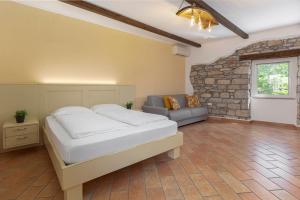 Letto o letti in una camera di Ražman Wine Rooms