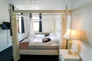 Voodi või voodid majutusasutuse Hotel Phønix Brønderslev toas