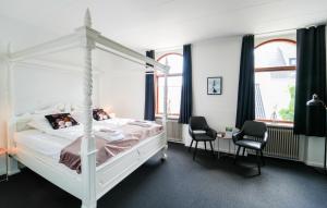 Voodi või voodid majutusasutuse Hotel Phønix Brønderslev toas