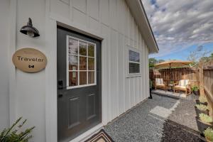a door to a house with a patio at Wanderers Retreat House in Comfort