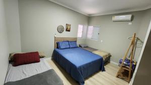 Katil atau katil-katil dalam bilik di Casa espaçosa, mesa de sinuca e piscina aquecida! +45 gambar