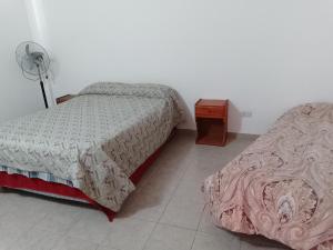 En eller flere senge i et værelse på solymar