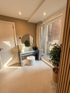 Ένα ή περισσότερα κρεβάτια σε δωμάτιο στο B&B De Amsterdamse Poort +9 φωτογραφίες