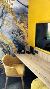 TV a/nebo společenská místnost v ubytování PRIMERA Smart