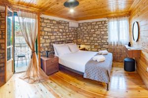 Ένα ή περισσότερα κρεβάτια σε δωμάτιο στο ORIZON LIVING Lefkada