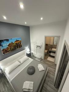 Ένα ή περισσότερα κρεβάτια σε δωμάτιο στο Blue Wave Apartment