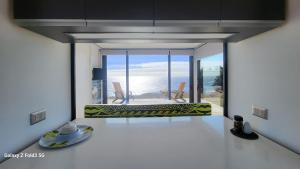 a rendering of a living room with a view of the ocean at Tiny House El PANGAL in Cáhuil