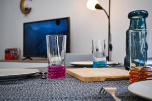 Μια τηλεόραση ή/και κέντρο ψυχαγωγίας στο L'Osmose - Central & Cosy - Accès Tram Strasbourg - Commerces à Proximité